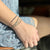 Lurex thread bracelet and colored zircons -001